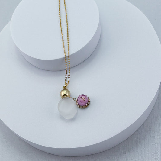 ピンクローズチャームの香水ビンペンダント